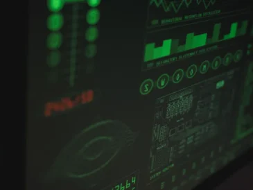 Laptop screen showing AI-powered cybersecurity monitoring for a small business