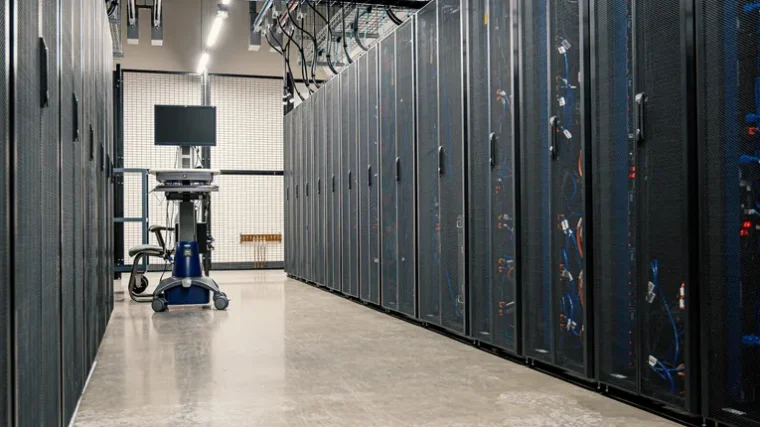 Modern data center corridor with server racks representing cloud technology