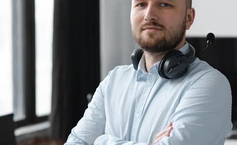 Customer service agent wearing a headset representing AI phone answering