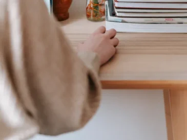 Freelancer working on a laptop at a home office desk