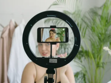 Person recording short-form video content on a smartphone for social media