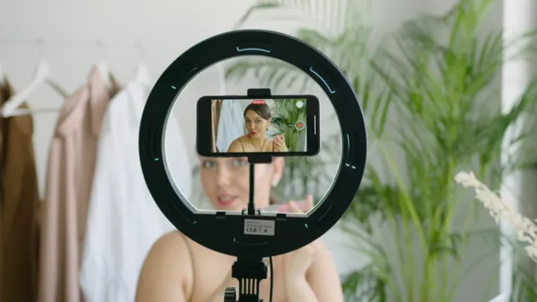 Person recording short-form video content on a smartphone for social media
