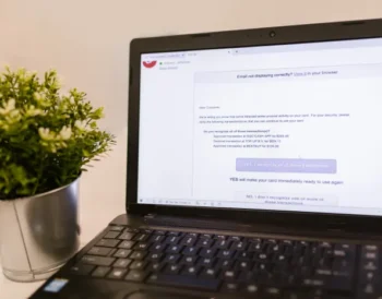 Laptop displaying a security lock icon representing antivirus protection
