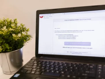 Laptop displaying a security lock icon representing antivirus protection