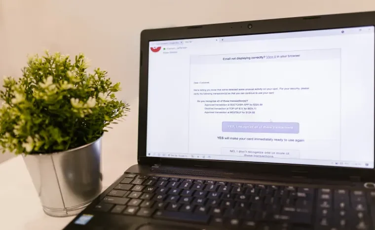Laptop displaying a security lock icon representing antivirus protection