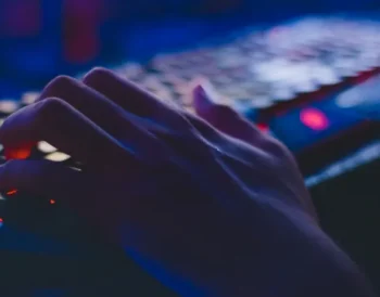 Person working on a document using free office software on a laptop