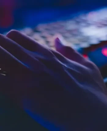 Person working on a document using free office software on a laptop