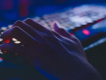 Person working on a document using free office software on a laptop