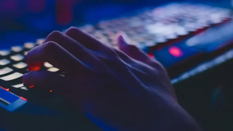 Person working on a document using free office software on a laptop