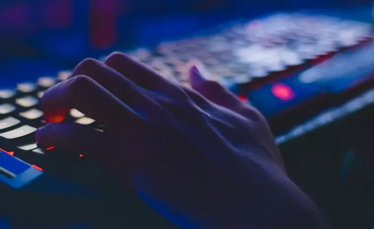 Person working on a document using free office software on a laptop