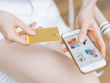 Person shopping online on a smartphone checking product reviews